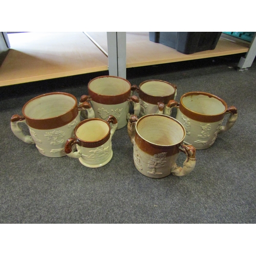 1194 - A selection of mostly 19th Century stoneware large two handled mugs and two tygs, some a/f (6)