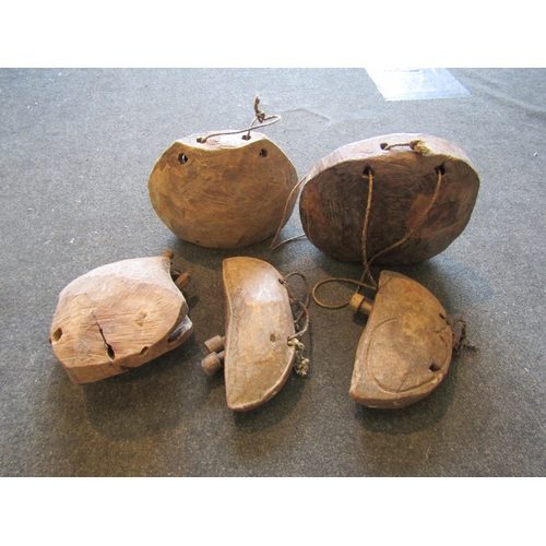 1256 - Five Indian rustic wooden bells with rope handles     (R) £80