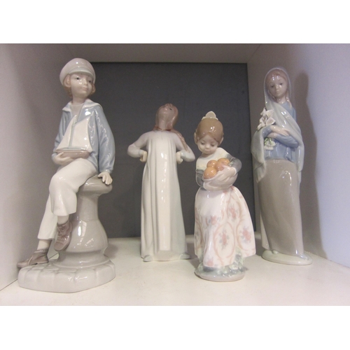 1278 - Four Lladro figurines including boy with boat, one a/f