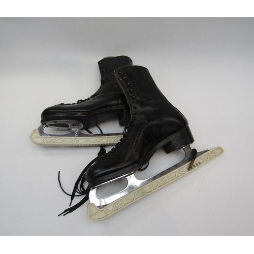 1293 - A pair of vintage ice skates bearing 