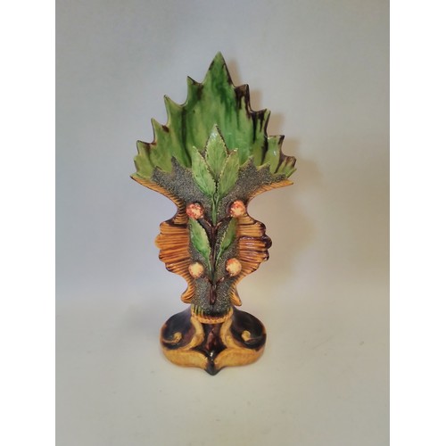 1295 - An A.J.F. Caldas majolica vase, laurel leaf and berry design with scrolled relief base, 32.5cm high,... 