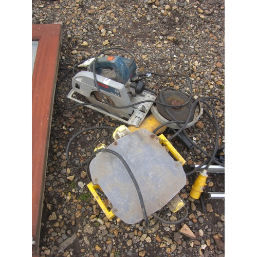 3406 - A 110v transformer, angle grinder and a Bosch saw