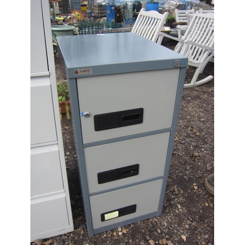 3415 - A three drawer metal filing cabinet