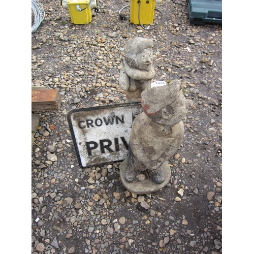 3416 - Two composition figurines and a pressed sign