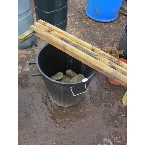 3487 - A bin containing pebbles, edging, etc