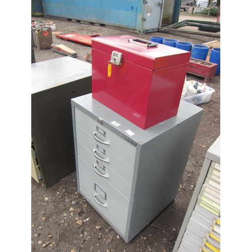 3577 - A metal four drawer filing cabinet and a lockable box