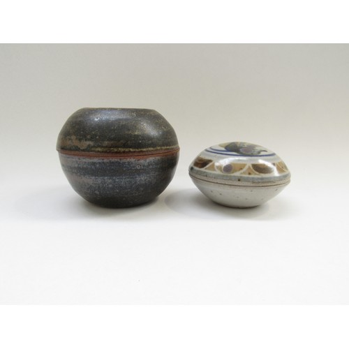 9012 - Two studio pottery lidded circular boxes with impressed potters seals. Largest 9.5 cm diameter x 7cm... 