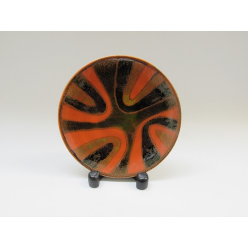 9068 - A Poole Delphis studio range plate, deep orange and green design. Blue backstamp 20.5cm diameter