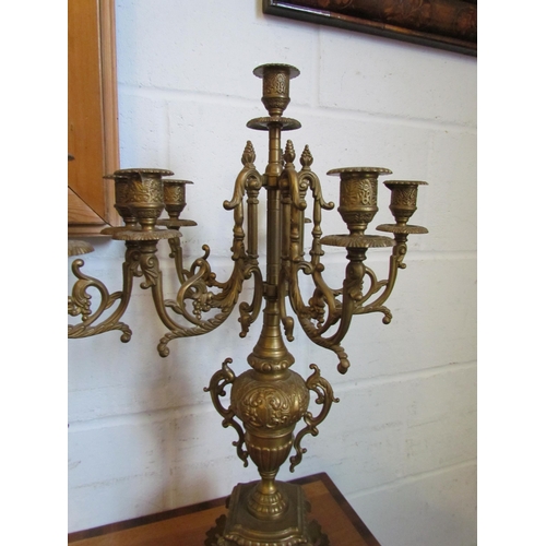 1016 - A pair of reproduction brassed gilt metal candelabrum, 60cm tall