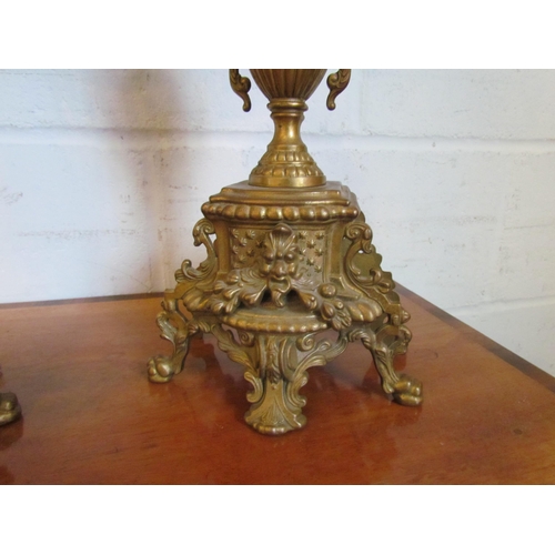 1016 - A pair of reproduction brassed gilt metal candelabrum, 60cm tall