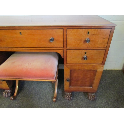 1018 - A Regency satinwood sideboard, four drawers, two cupboards, on lion-paw feet, 75cm tall x 123cm wide... 