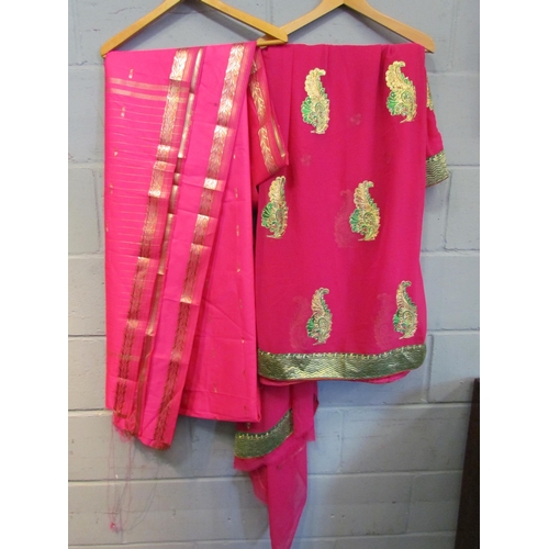 1064 - Three sari textiles in vibrant pinks, gold and green, two bearing original retail labels