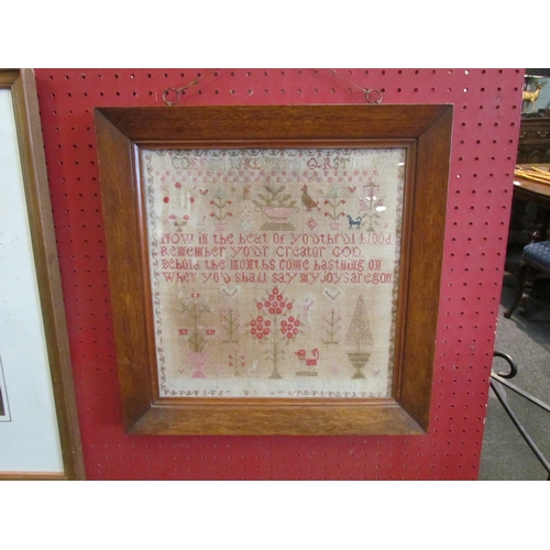 1081 - A 19th Century religious alphabet sampler, framed and glazed, some discolouration, 31cm x 30.5cm ima... 