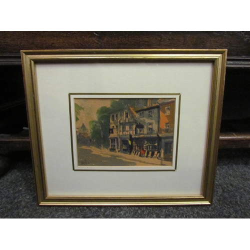 1089 - TERENCE. M. RUDKIN (Local artist): A watercolour depicting a town/street scene of period buildings i... 