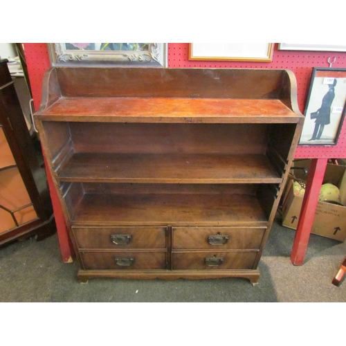 1093 - A Regency style mahogany bookcase, the base set with drawers, 92cm tall x 84cm wide x 21cm deep