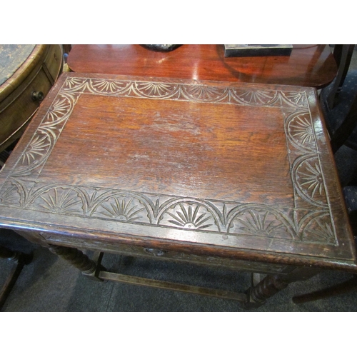 1139 - A 19th Century carved oak single drawer side table, with barley twist supports on stretcher base, 72... 