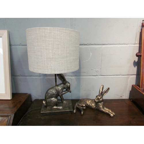 1140 - A bronzed effect hare table lamp and similar figure of recumbent hare (2)