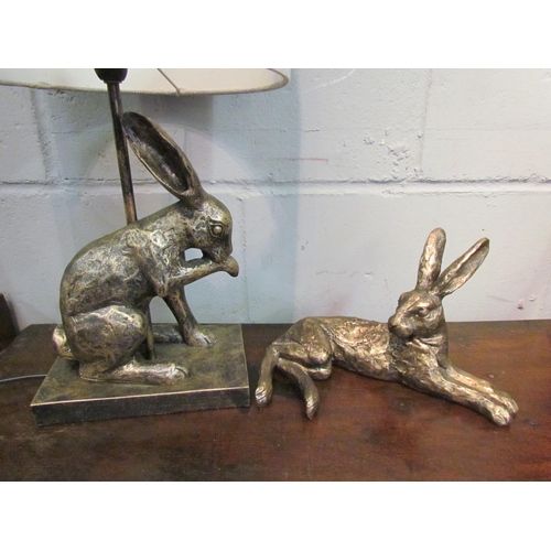 1140 - A bronzed effect hare table lamp and similar figure of recumbent hare (2)