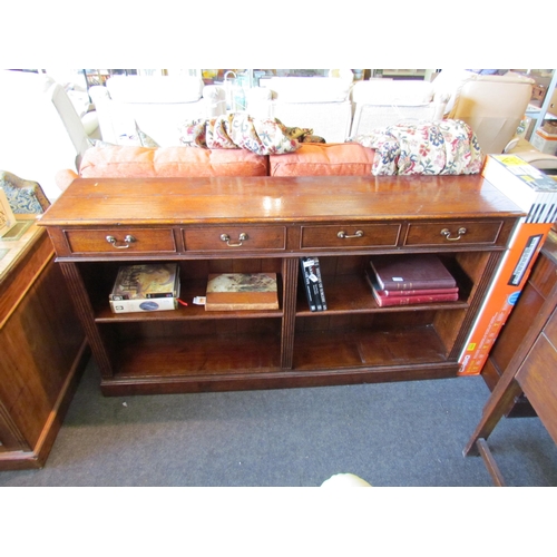 1172 - A Georgian style country oak half-height bookcase, the four drawers over four sections of shelving, ... 