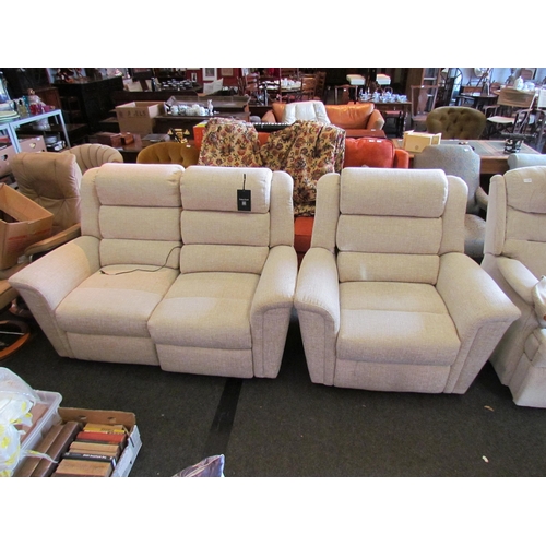 1185 - A Parker Knoll two seater electric reclining sofa and matching armchair