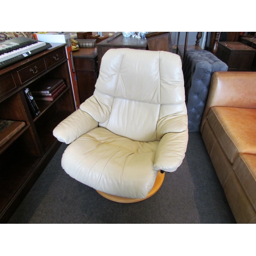 1187 - A Stressless cream leather reclining armchair