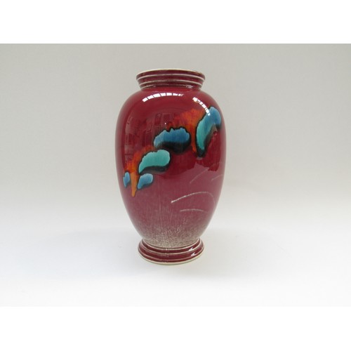 9082 - A Poole pottery volcano vase, marks to base.  21cm high