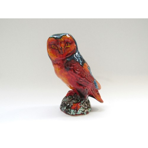 9083 - An Anita Harris Pottery figure of an owl in multi coloured glazes.  Marks to the base.  18cm high