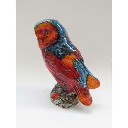 9083 - An Anita Harris Pottery figure of an owl in multi coloured glazes.  Marks to the base.  18cm high