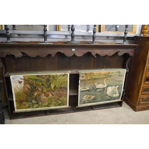 2221 - A large oak dresser top shaped cornice two shelves