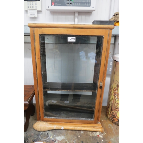 2098 - A Victorian pine display cabinet glazed back and single glazed door