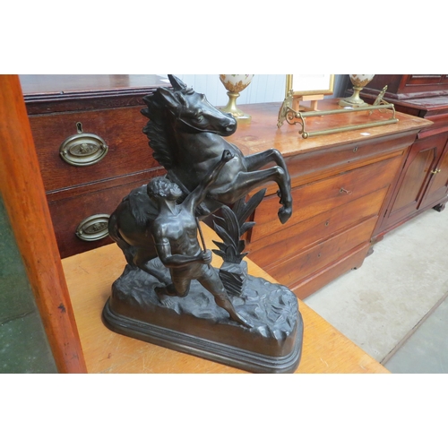 2133 - A pair of spelter marley horses