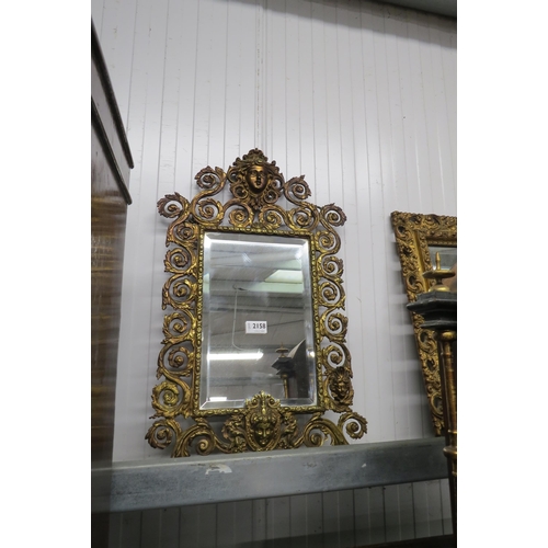 2158 - A gilt metal wall mirror mask and leaf detail 50 x 75cm