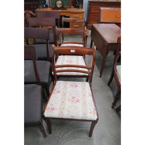 2174 - Two mahogany bar-back chairs and a matching elbow chair