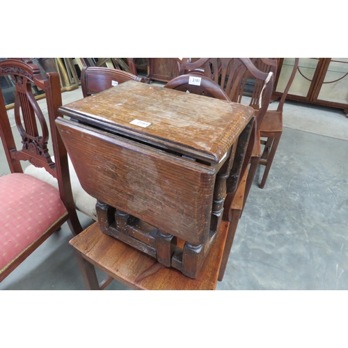 2183 - A pair of Edwardian mahogany carved back dining chairs and an oak drop leaf coffee table