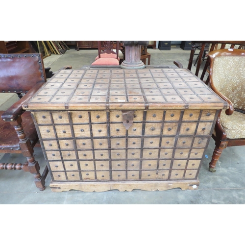 2186 - An Indian hardwood and metal bound dowry chest