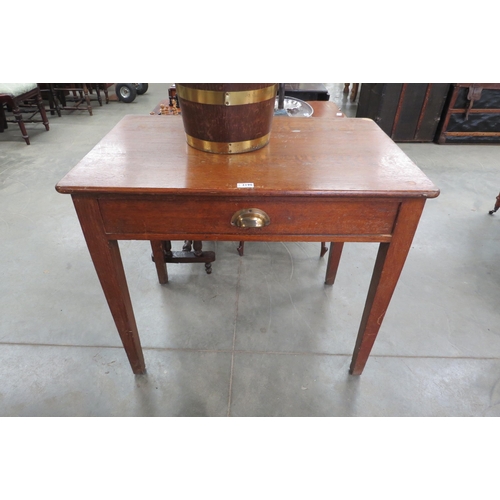 2190 - An oak single drawer side table