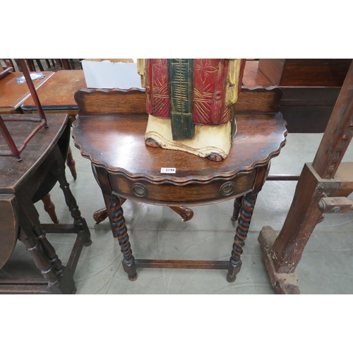 2196 - A 1930's oak barleytwist demi-lune side table