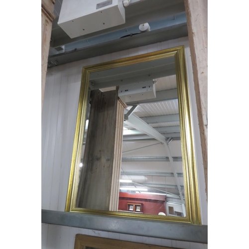 2202 - A gilt framed rectangular wall mirror 74 x 102cm