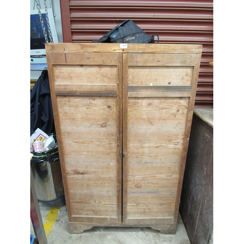 2299 - A rustic two door pine cupboard