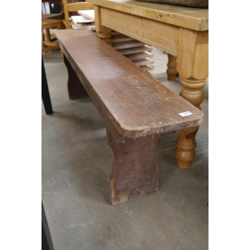 2253 - A rustic pine bench, shaped ends