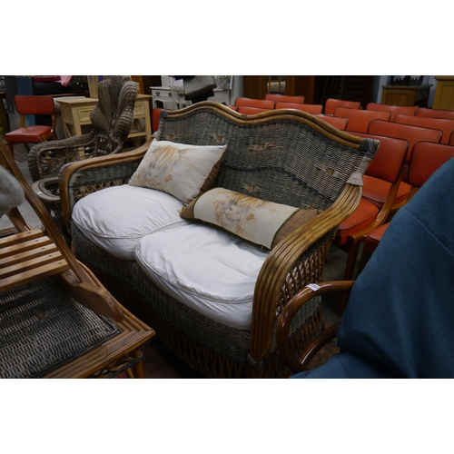 2369 - A wicker two seater sofa and matching coffee table    (R) £40