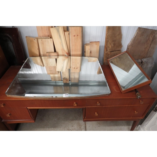 2345 - A 1960's teak dressing table with mirror back and drawer frieze