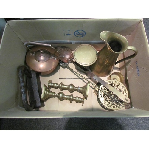 1188 - A quantity of metalwares including brass candlesticks and copper ewer