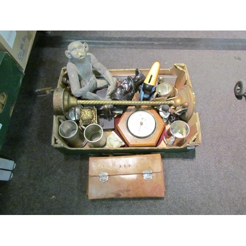 1209 - A box of assorted items including modern Guinness money box, monkey figure, barometer (a/f), pewter ... 