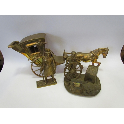 1212 - A brass horse and carriage ornament, a figure of blacksmith and another (3)