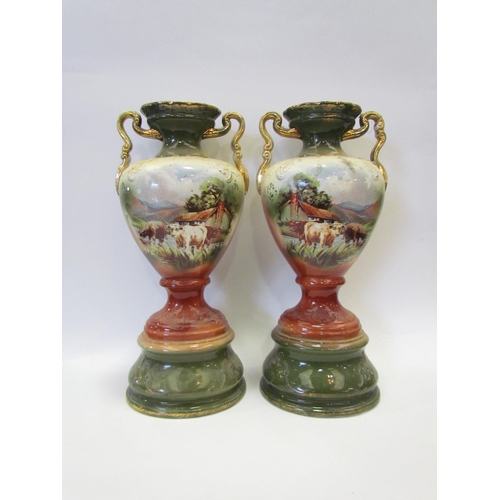 1216 - A pair of ceramic vases with cattle images marked 