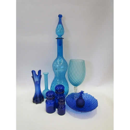 1220 - A collection of blue glass including oversized pharmacy style bottle, jars etc.