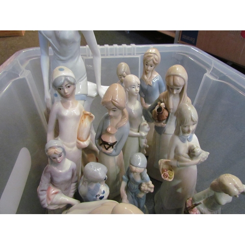 1238 - A box of assorted figures, mostly ladies