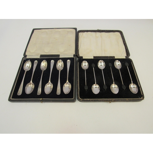 1309 - A set of six silver coffee bean spoons, marked Birmingham, cased, together with six silver teaspoons... 