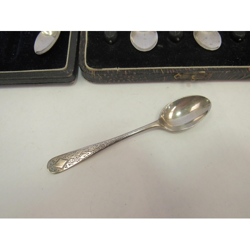 1309 - A set of six silver coffee bean spoons, marked Birmingham, cased, together with six silver teaspoons... 